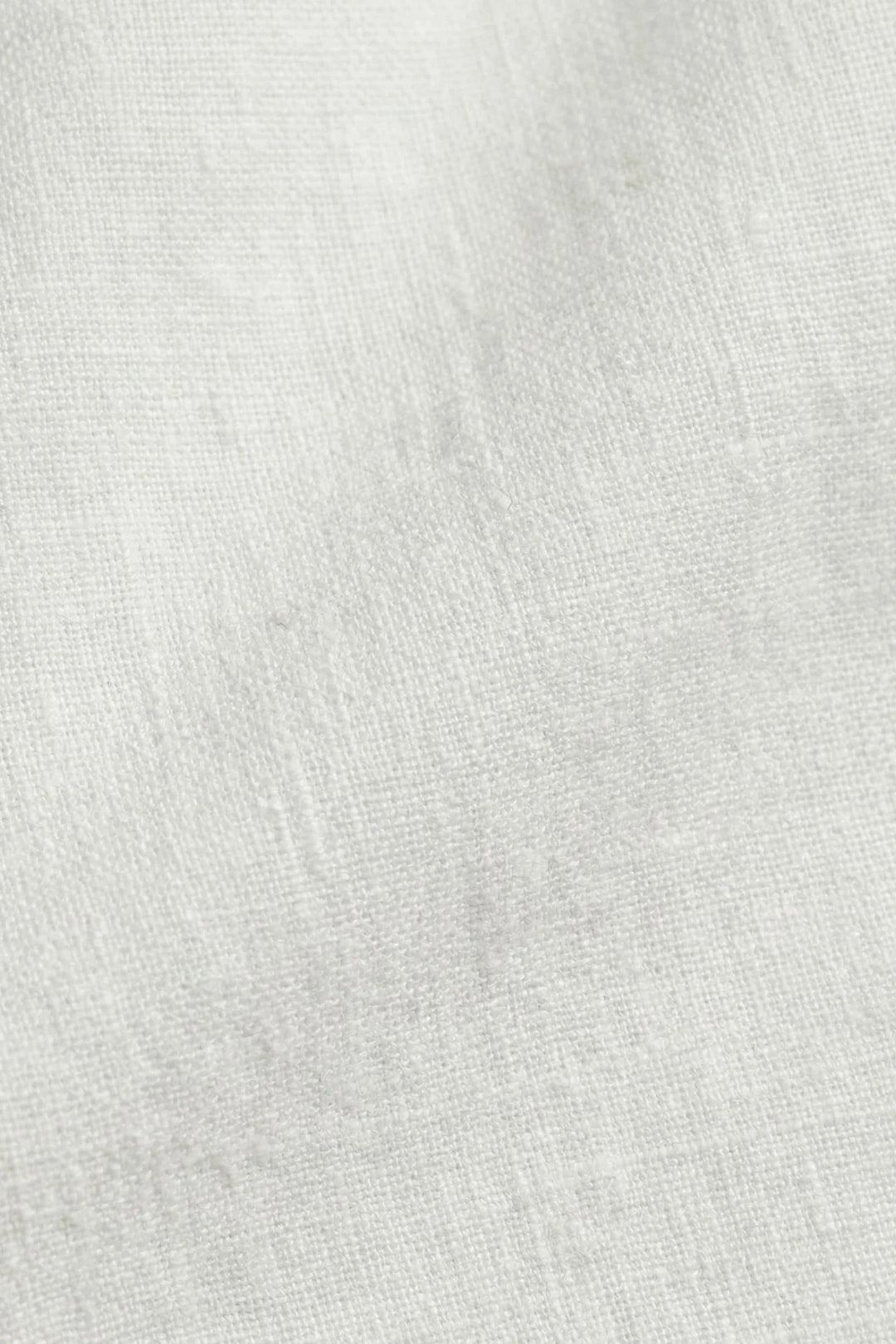 The Soriano Linen Drawstring Trousers White flat lay