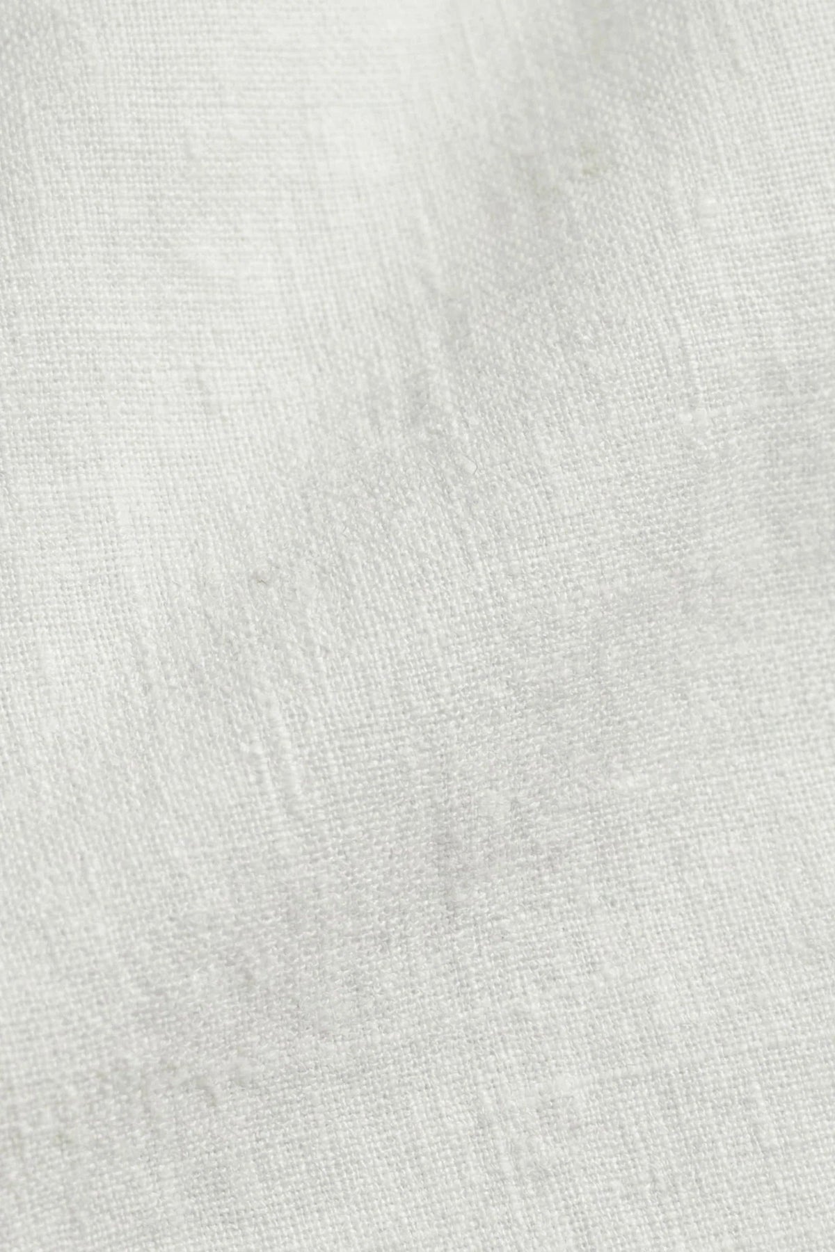 The Soriano Linen Drawstring Trousers White flat lay